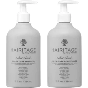 A black and white bottle of Pure Colour Angel Colour Fade Defence Shampoo and a matching black and white bottle of Colour Fade Defence Conditioner