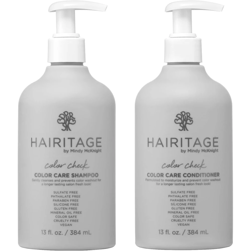 A black and white bottle of Pure Colour Angel Colour Fade Defence Shampoo and a matching black and white bottle of Colour Fade Defence Conditioner