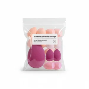 A violet-colored, teardrop-shaped makeup sponge with a textured surface for blending foundation, powder, and cream products.