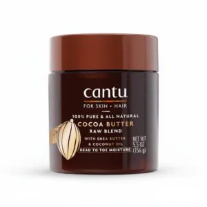 A round tub with a white label featuring the Cantu logo and product name. The tub is filled with a thick, creamy cocoa butter-colored product.