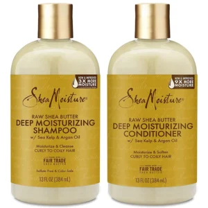 Bottle of Cantu Shea Butter Replenishing Shampoo and Conditioner in a light green color with the Cantu logo and product name visible on the label.