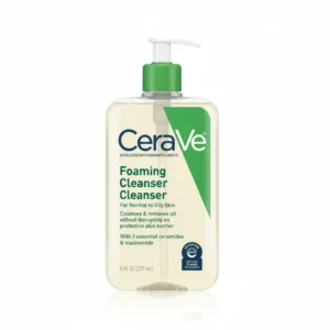 A white bottle with a pump dispenser, labeled 'CeraVe Foaming Facial Cleanser' in blue text. The bottle has a simple, minimalist design.