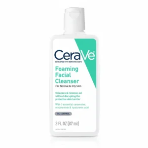A white bottle with a blue label, containing a foaming facial cleanser. The label displays the CeraVe brand name and product name.