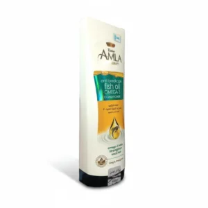 A green and white bottle of Dabur Amla Oil Therapy Anti-Breakage Conditioner with the product label visible