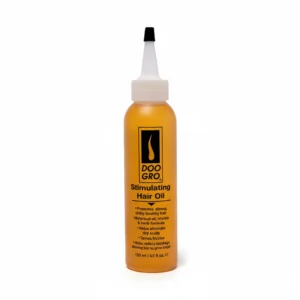 A brown glass bottle with a black cap, containing a clear golden-colored hair oil. The label has the Doogro brand name and 'Stimulating Hair Oil' text.