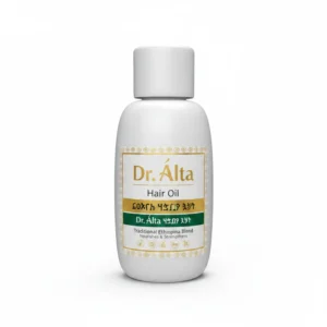 A bottle of Dr Alta Amla Hair Oil with a green and white label. The bottle contains a golden-colored hair oil.