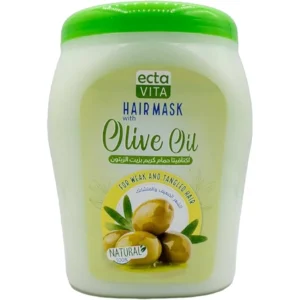 A white jar with a green and gold label, containing a thick, creamy hair mask product