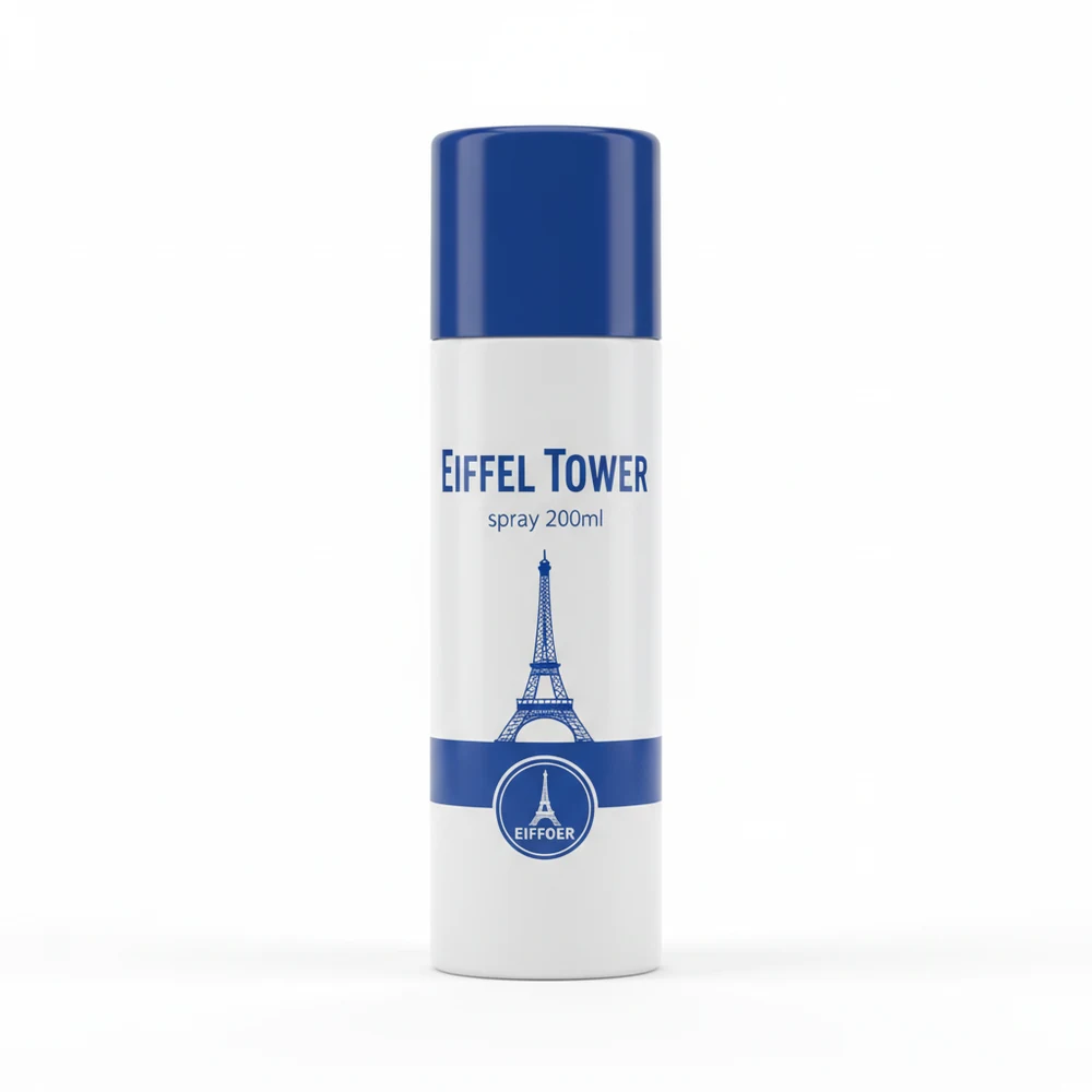 A shimmery, iridescent body mist in a glass bottle with an Eiffel Tower-inspired design on the label