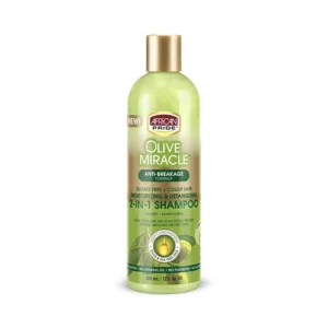 A bottle of African Pride 2-in-1 Shampoo & Conditioner with a purple and white label. The bottle is clear, showing the light brown shampoo and conditioner formula inside.