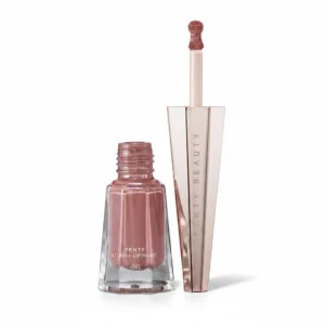 A 4ml bottle of FENTY Stunna Lip Paint in a soft-matte finish. The bottle has a black cap and label with the FENTY logo.