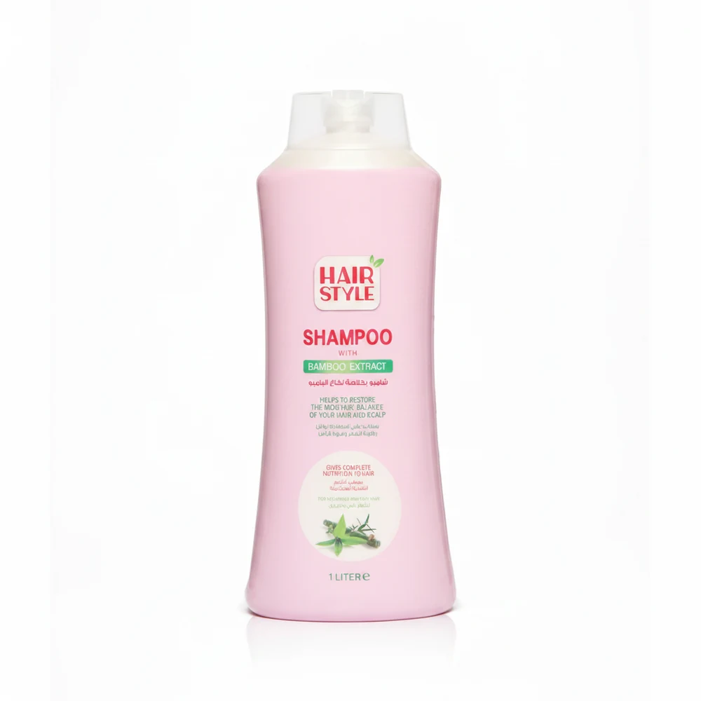 A 33.8 fl oz bottle of Boo Bamboo Strengthening Shampoo with a green and white label featuring the brand name, product name, and key ingredients like bamboo, wheat, and garlic