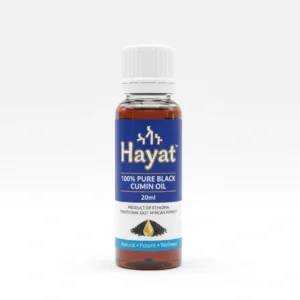 A glass bottle with a black label containing 100% pure black cumin seed oil