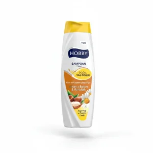 A 750ml bottle of Hobby Shampoo with a white and blue label. The label features the Hobby brand name and lists the key ingredients as Dead Sea minerals, calendula, and aloe vera.