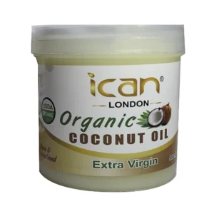A glass jar containing clear, pale yellow coconut oil. The label on the jar says 'iCan London Organic Coconut Oil' in black text.