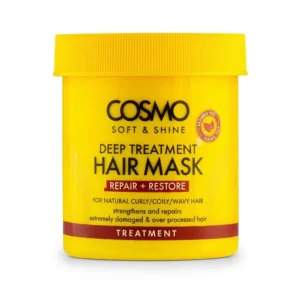 A bottle of Karis & Cosmo Hair Treatment with a white label and gold accents. The bottle contains a thick, creamy hair treatment product.
