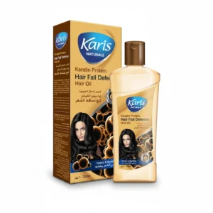 A bottle of Karis Naturals Anti Hair Fall Hair Oil with a label showing the product name and ingredients.