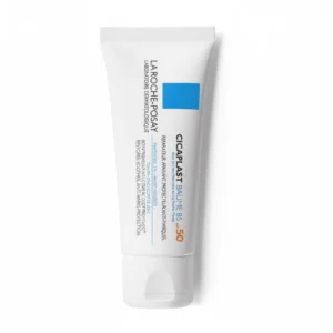 A bottle of La Roche-Posay Cicaplast B5 SPF 50 Soothing Face & Body Spray. The bottle is white with blue and green accents, and the label displays the product name and key ingredients.