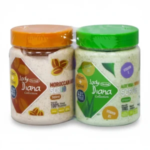 A glass jar with a white label containing a brown, grainy body scrub product