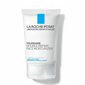 A white and blue bottle of La Roche-Posay Toleriane Double Repair Face Moisturizer with SPF 30. The label displays the brand name, product name, and key ingredients.