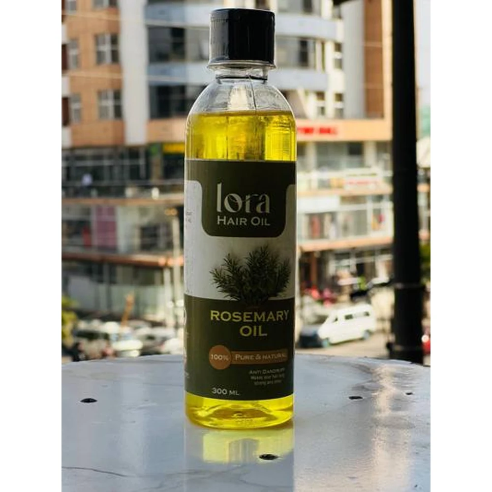 A bottle of Lavar Rosemary Hair Oil with a green label and rosemary leaf illustration