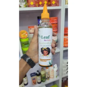 A clear glass bottle with a green label containing Leaf Oil for Kids. The label features a leaf icon and the product name.