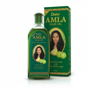 A 200ml bottle of Dabur Amla Hair Oil. The bottle has a green and yellow label with the Dabur logo and 'Amla Hair Oil' text.