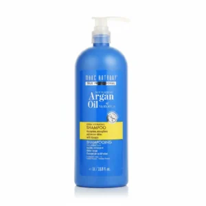 A 1L bottle of Marc Anthony Argan Oil Shampoo & Conditioner in a light blue and white label design