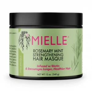 A jar of Mielle Rosemary Mint Strengthening Hair Masque in a green and white label. The product is a thick, creamy white hair treatment.