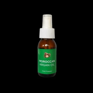 A clear glass bottle with a black cap, containing a golden-colored Moroccan argan oil. The label features the Raw African brand name and 'Moroccan Argan Oil' text.