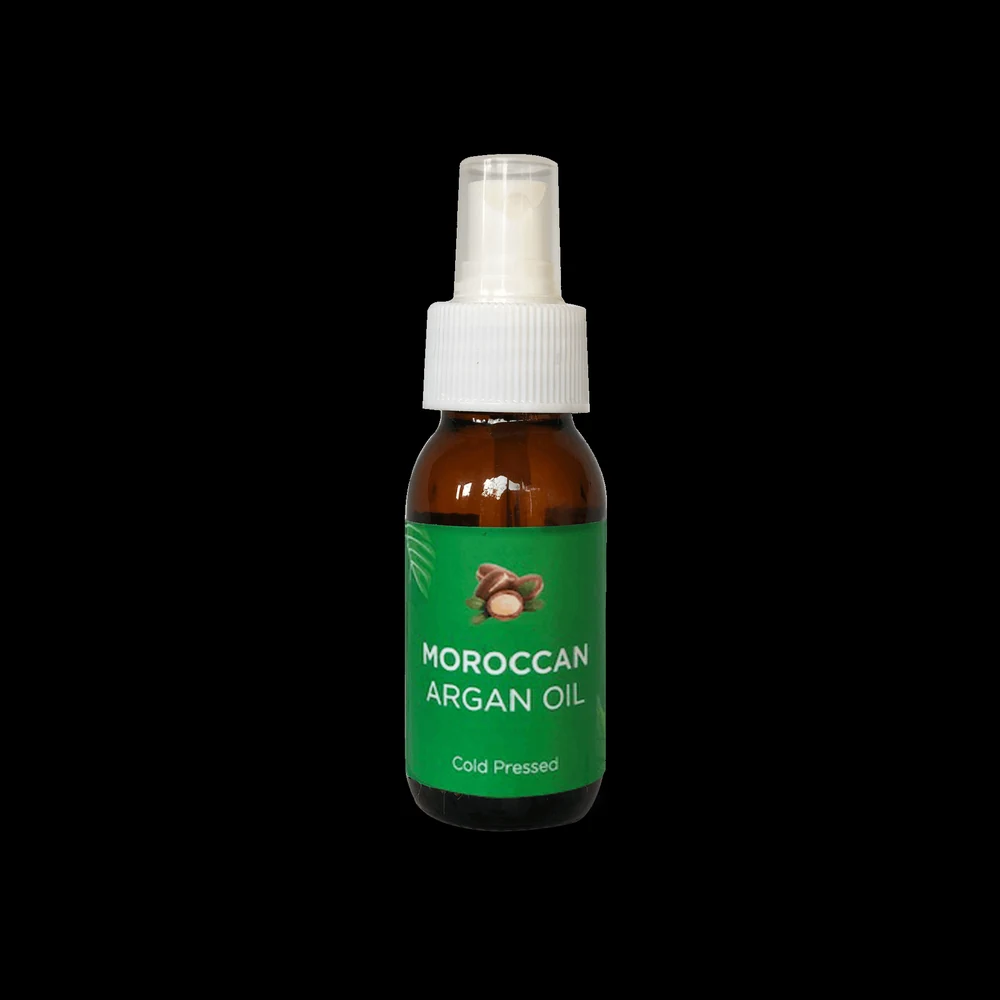 A clear glass bottle with a black cap, containing a golden-colored Moroccan argan oil. The label features the Raw African brand name and 'Moroccan Argan Oil' text.