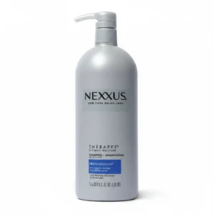A 1L bottle of Nexxus Therappe Replenishing Shampoo & Conditioner. The bottle has a white and blue label with the Nexxus logo.