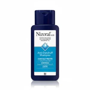 A bottle of Nizoral Anti-Dandruff Shampoo with a white label and red cap. The label displays the Nizoral brand name and indicates the product contains 1% Ketoconazole.