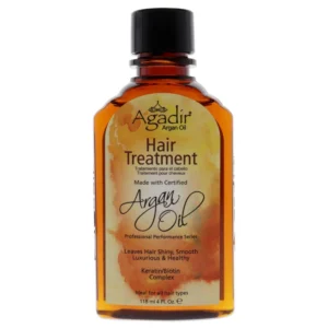 A bottle of Agadir Argan Oil Treatment with a light brown label and cap. The bottle contains a clear, golden-colored oil.