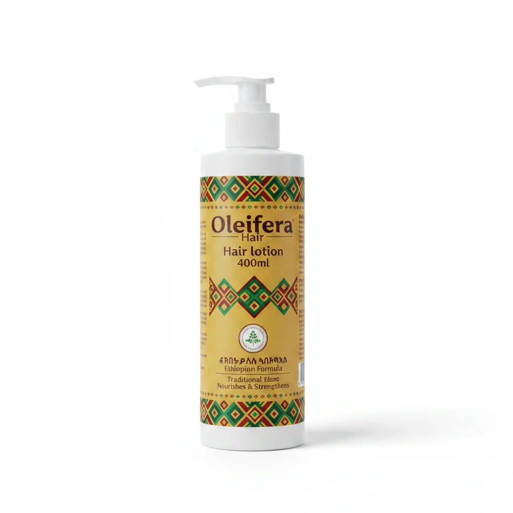 A 400ml bottle of Oleifera Hair Lotion with a green and white label. The label features the Oleifera brand name and indicates the product contains 100% pure, natural Moringa oil.