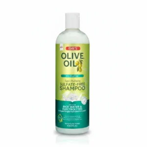 A bottle of ORS Olive Oil Shampoo with a green and yellow label. The bottle has a pump dispenser top.