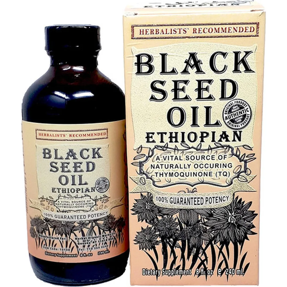 A dark amber-colored glass bottle with a black label displaying the Orsam brand name and 'Black Cumin Seed Oil' text.