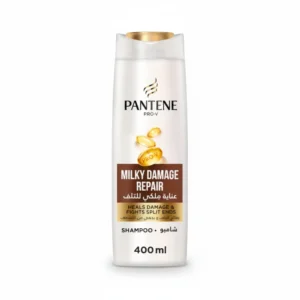 A white bottle with the Pantene Pro-V logo and 'Milky Damage Repair Shampoo' label. The bottle contains 400ml of the shampoo product.