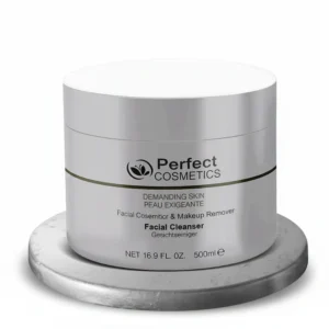 A bottle of Perfect Cosemitics Facial Cleanser & Makeup Remover. The bottle has a white label with the brand name and product name, and the product is a clear, light-colored liquid.
