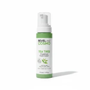 A 175ml bottle of Revel Beauty Instant Glow Foaming Face Wash with a built-in brush. The bottle has a white label with the Revel Beauty logo and product name.