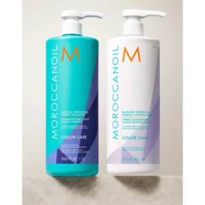 A bottle of Revel and Cosmo Hair Color Shampoo in dark brown color, with a label showing the brand name and product details.
