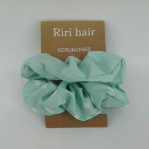 Riri Hair Scrunches in a neutral color, featuring a soft, textured material and a simple, minimalist design