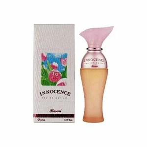 A bottle of Royal and Innocence Body Spray with a white and gold label, featuring a floral design.
