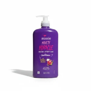 A 1L bottle of Aussie Multi Miracle Conditioner with a label showing the Aussie logo and 'Multi Miracle Conditioner' text. The bottle has a light blue color.
