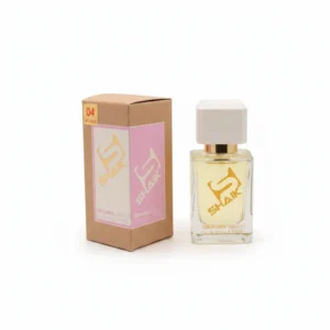 A glass bottle of Shaik luxury Arabian perfume in a sleek, rectangular shape with a gold cap. The label features the Shaik brand name in an elegant script.