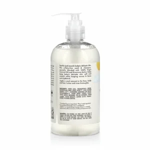 A bottle of SheaMoisture Baby Shampoo with a white label featuring the SheaMoisture logo, the product name, and images of raw shea butter, chamomile, and argan oil