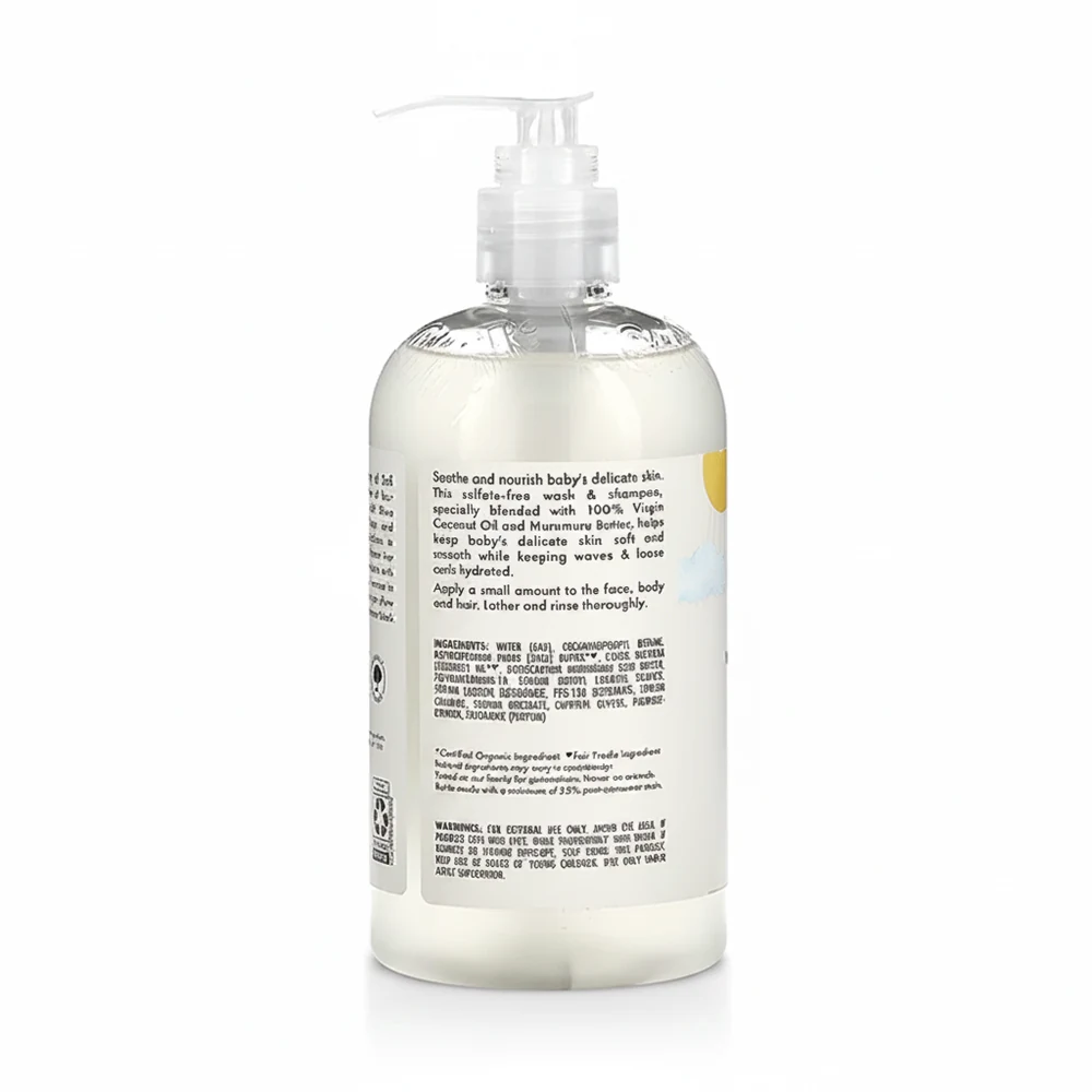 A bottle of SheaMoisture Baby Shampoo with a white label featuring the SheaMoisture logo, the product name, and images of raw shea butter, chamomile, and argan oil