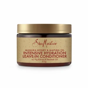 A bottle of Shea Moisture Jamaican Black Castor Oil Leave-In Conditioner with a green and white label. The bottle has a pump dispenser and contains 312g of product.