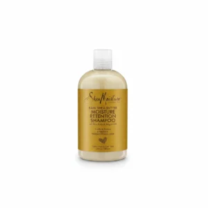 A bottle of Shea Moisture Curl & Shine Shampoo with a green and white label. The bottle has a pump dispenser and contains 384ml of product.