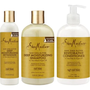 A bottle of Shea Moisture Mafura Oil & Baobab Shampoo & Conditioner Set in a light green and white color scheme. The label displays the product name and key ingredients.