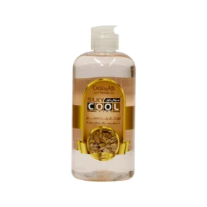 A 5L bottle of Milia Silky Cool Body Massage Oil with a label featuring the oud fragrance and moisturizing properties